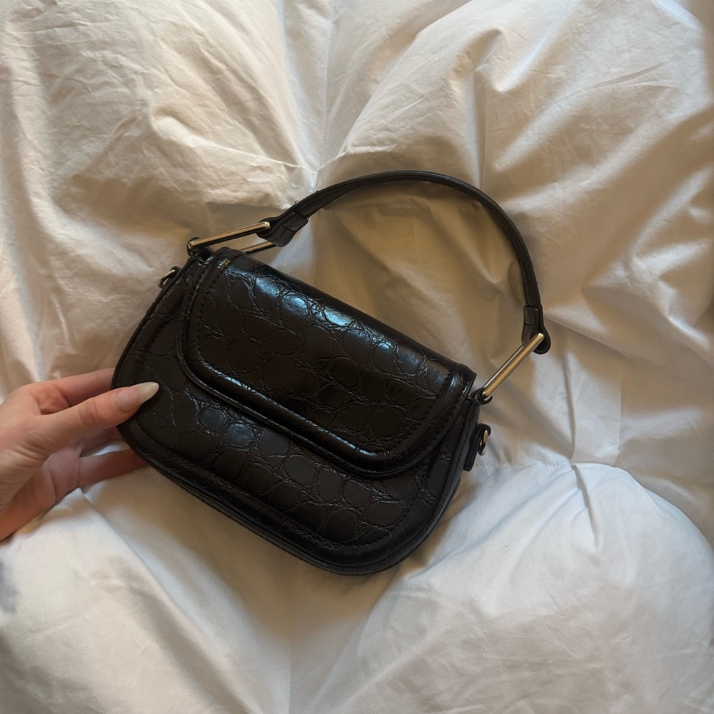 Black croc top handle bag